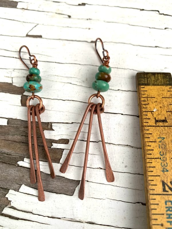 Turquoise and copper fringe earrings closeup scaled