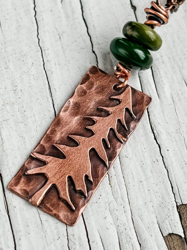 turquoise and copper whispering pine tree necklace closeup scaled